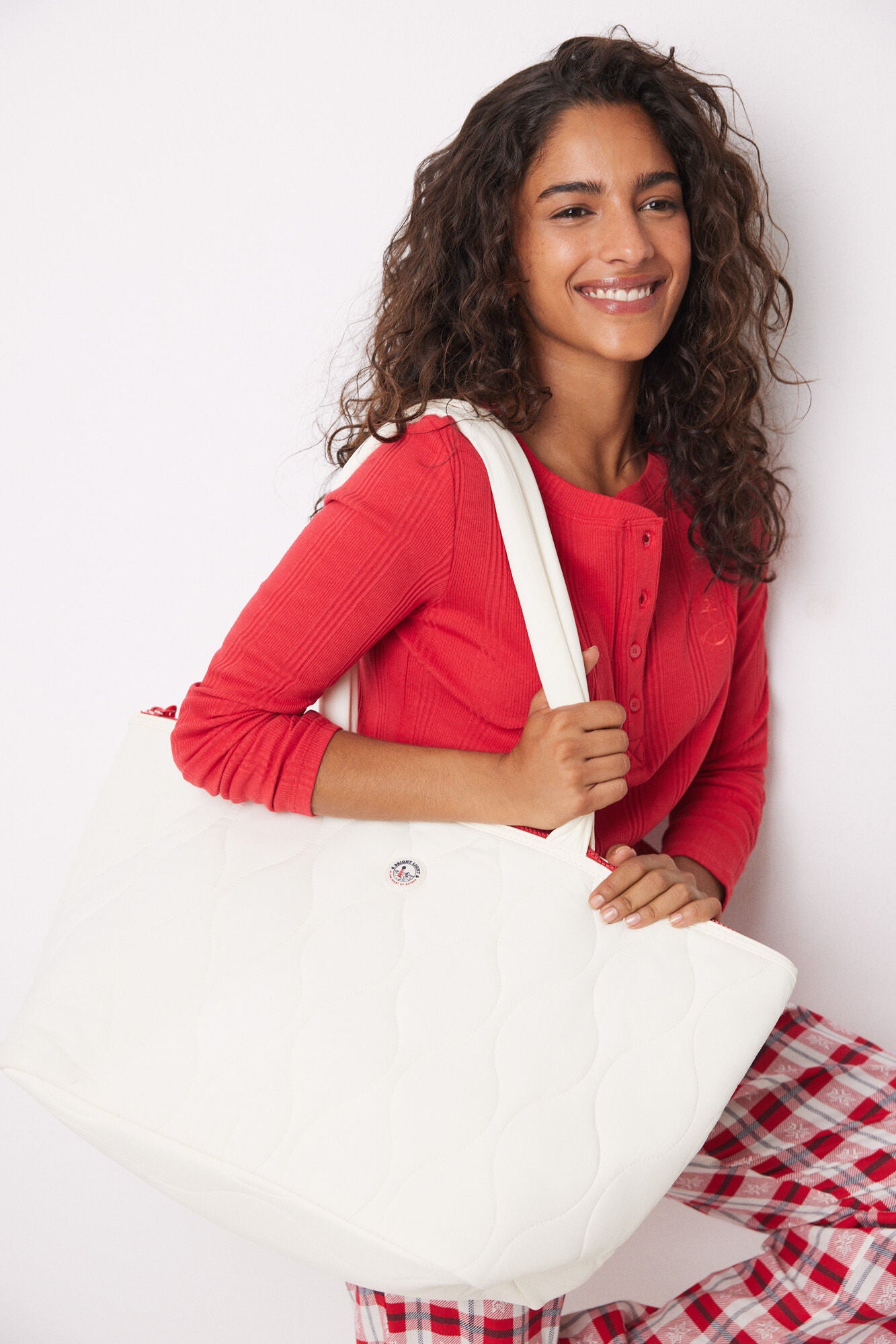 White padded nylon bag