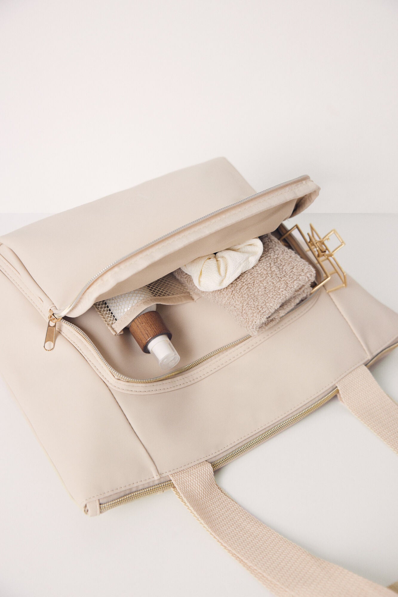 Large beige rubberized bag